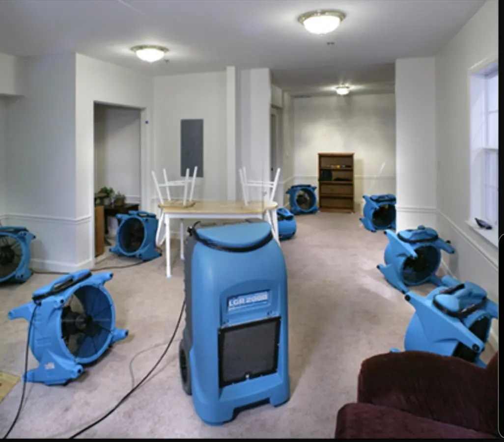 Air movers and dehumidifier setup for Water Extraction & Removal in West Fargo